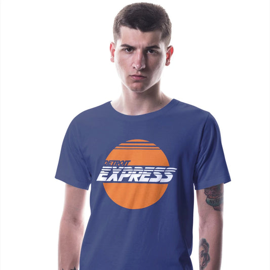 A man is wearing a blue t-shirt with a graphic design of a sunset and 'Detroit Express' text on a white background