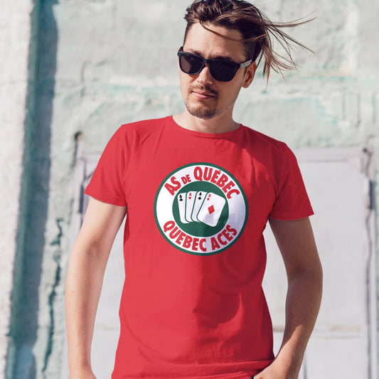 A man in sunglasses is wearing a red t-shirt with a poker cards logo and 'AS DE QUEBEC - QUEBEC ACES' text, standing against a light-colored wall