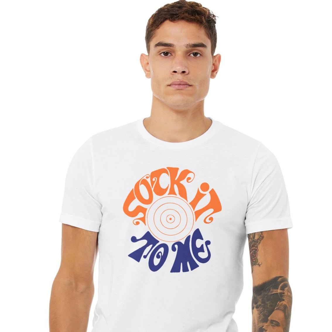A man is wearing a white t-shirt with 'Sock it to me' design on a white background
