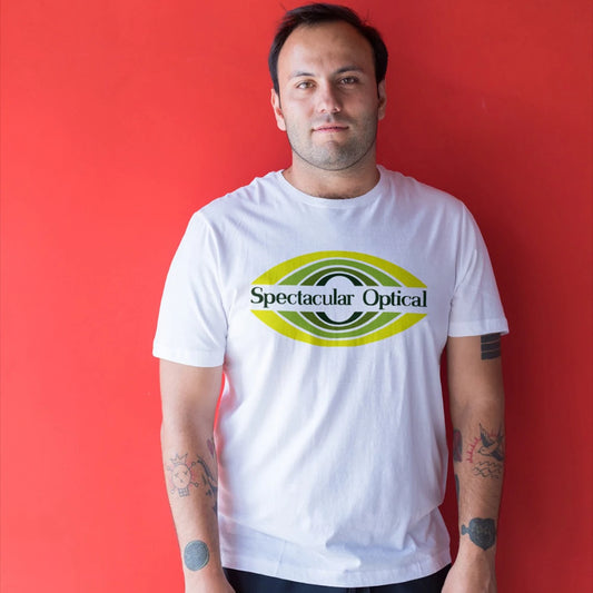 A man is wearing a white t-shirt with 'Spectacular Optical' logo in the shape of an eye, against a red background