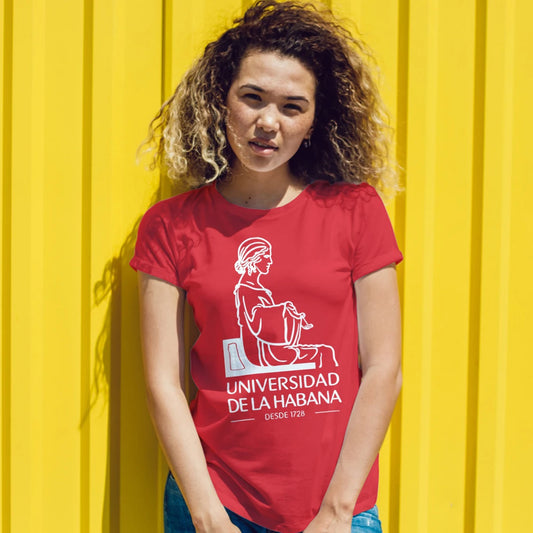 A woman is wearing a red t-shirt with a graphic of the Alma Mater sculpture and 'UNIVERSIDAD DE LA HABANA, DESDE 1728' text against a yellow background